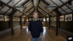 Italian photojournalist Enrico Dagnino at his "War Zone" exhibit