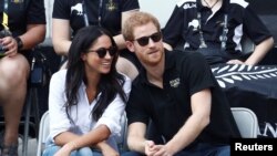 Le prince Harry avec Meghan Markle lors d'un match de tennis à Toronto, le 25 septembre 2017