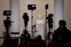 FILE - Television news equipment near a hearing room Monday, Dec. 9, 2019, on Capitol Hill in Washington. (AP Photo/Patrick Semansky)