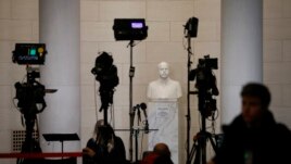 FILE - Television news equipment near a hearing room Monday, Dec. 9, 2019, on Capitol Hill in Washington. (AP Photo/Patrick Semansky)