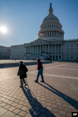 FILE - People visit the Capitol during the recent federal government shutdown over border wall money, in Washington, Dec. 26, 2018.