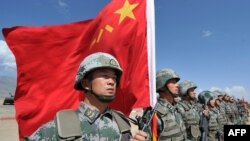 资料照：中国军队参加上海合作组织在吉尔吉斯斯坦举行的反恐联合军演。（2016年9月19日）
