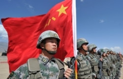 中国军队参加上合组织成员国联合军演。（2016年9月19日）