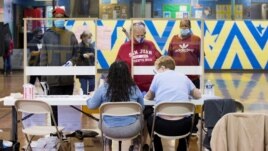 Voters prepare to cast their ballot in the Democratic primary in Philadelphia, Pennsylvania, U.S., June 2, 2020.