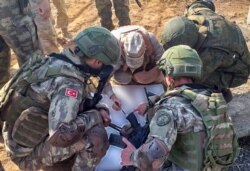 SYRIA -- Turkish soldiers meet with Russian soldiers during a patrol in Ayn Al-Arab, in Northern Syria, November 5, 2019