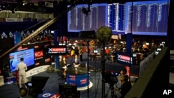 South African television channels report results as they come in from the Independent Electoral Commission Results Center in Pretoria, South Africa, May 9, 2019.