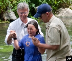 Margaret Thompson, age 10, is baptized in Lititz Run, across the street from Lancaster Evangelical Free Church
