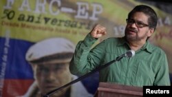 FILE - Revolutionary Armed Forces of Colombia's lead negotiator Ivan Marquez addresses media during conference in Havana, May 27, 2014.