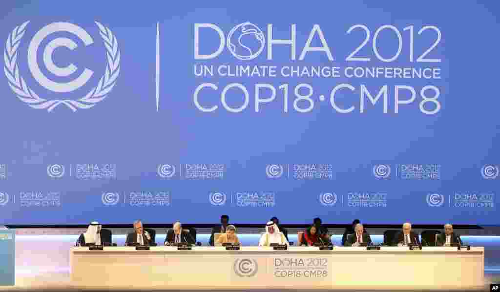 Organizers are seen on stage at the opening ceremony of the 18th United Nations climate change conference in Doha, Qatar, Nov. 26, 2012.