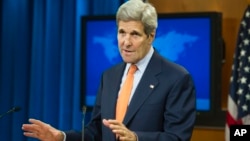 ລັດຖະມົນຕີການຕ່າງປະເທດສະຫະລັດ ທ່ານ John Kerry ຖະແຫຼງ ທີ່ກະຊວງຕ່າງປະເທດ ກ່ຽວກັບ ການນຳລາຍງານ ປະຈຳປີ ອອກເຜີຍແຜ່ (25 ມິຖຸນາ 2015) 