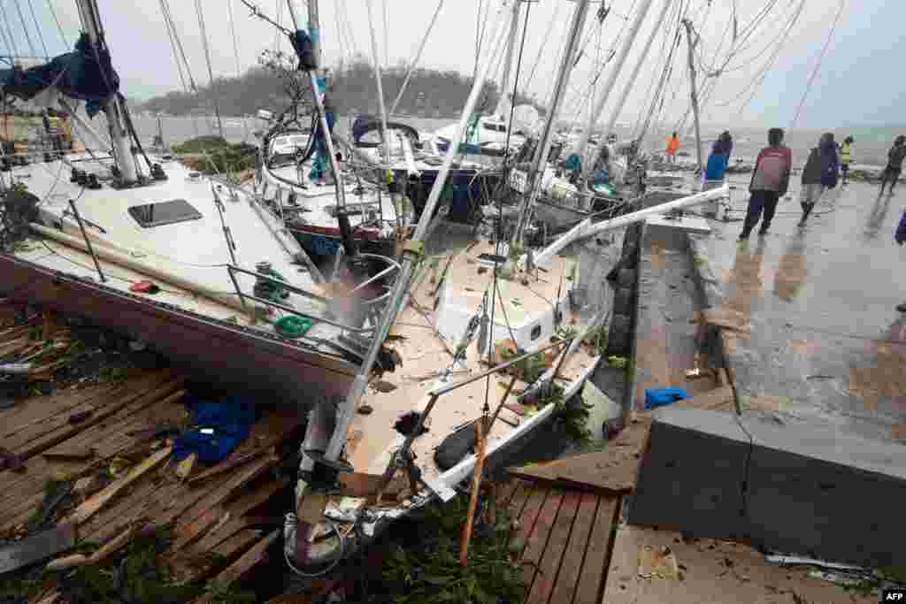 This handout photo taken and received on March 14, 2015 by UNICEF Pacific shows storm damage to boats caused by Cyclone Pam, in the Vanuatu capital of Port Vila.