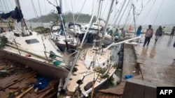 Kapal rusak akibat Siklon Pam di ibukota Vanuatu, Port Vila, 14 Maret 2015. (AFP PHOTO/UNICEF Pacific)