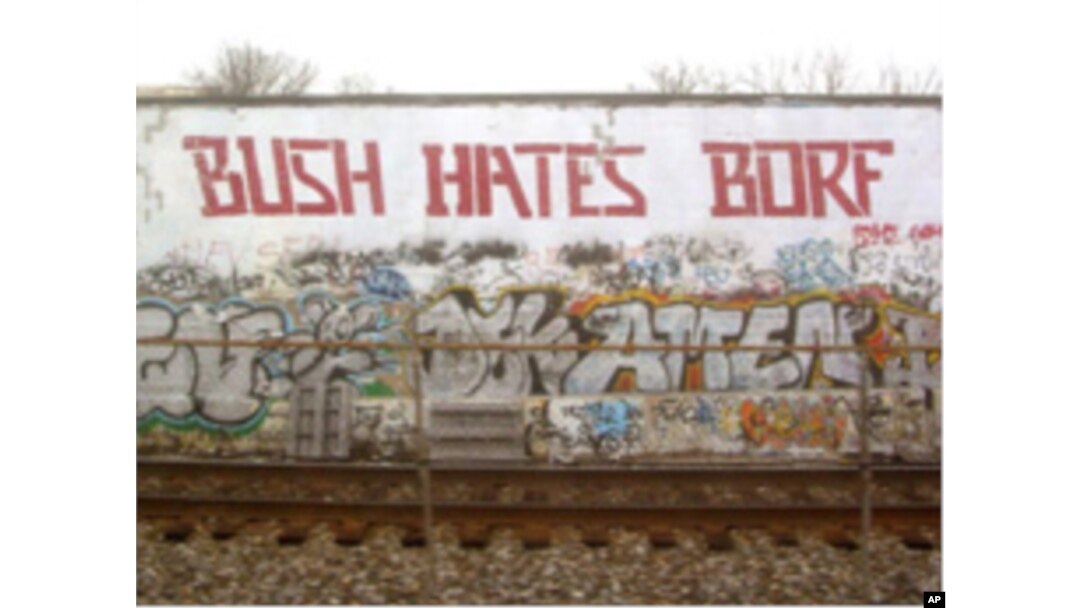 A tagger who called himself Borf gave Cool Disco Dan a run in the mid-2000s. Someone - likely not Borf since the style looked different - changed Bush to Obama recently.