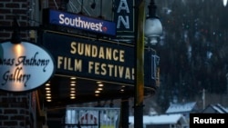FILE - The marque on the Egyptian Theatre is pictured before the opening day of the Sundance Film Festival in Park City, Utah, Jan. 21, 2015. 