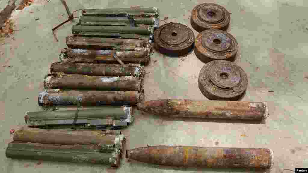 Ammunition seized from suspected members of Hezbollah are displayed after a raid of a building in Nigeria's northern city of Kano May 30, 2013.