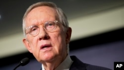 FILE - Senate Minority Leader Harry Reid, D-Nev., says Republicans "have decided once again to place partisan ideological agendas over the well-being of the nation.”