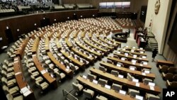 Rep. Choi Won-sik, second from right, of the opposition People's Party, speaks at the National Assembly in Seoul, South Korea, Monday, Feb. 29, 2016.