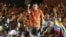 Venezuela's opposition leader and presidential candidate Henrique Capriles (C) speaks during a meeting with students in Maracaibo, March 18, 2013. 