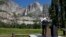 President Barack Obama speaks by the Sentinel Bridge, in front of the Yosemite Falls, the highest waterfall in Yosemite National Park, California, June 18, 2016.