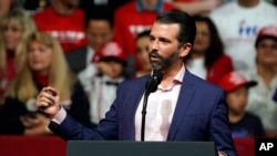 FILE - Donald Trump Jr. speaks at a rally in support of his father, President Donald Trump, in Phoenix, Arizona, Feb. 19, 2020. 