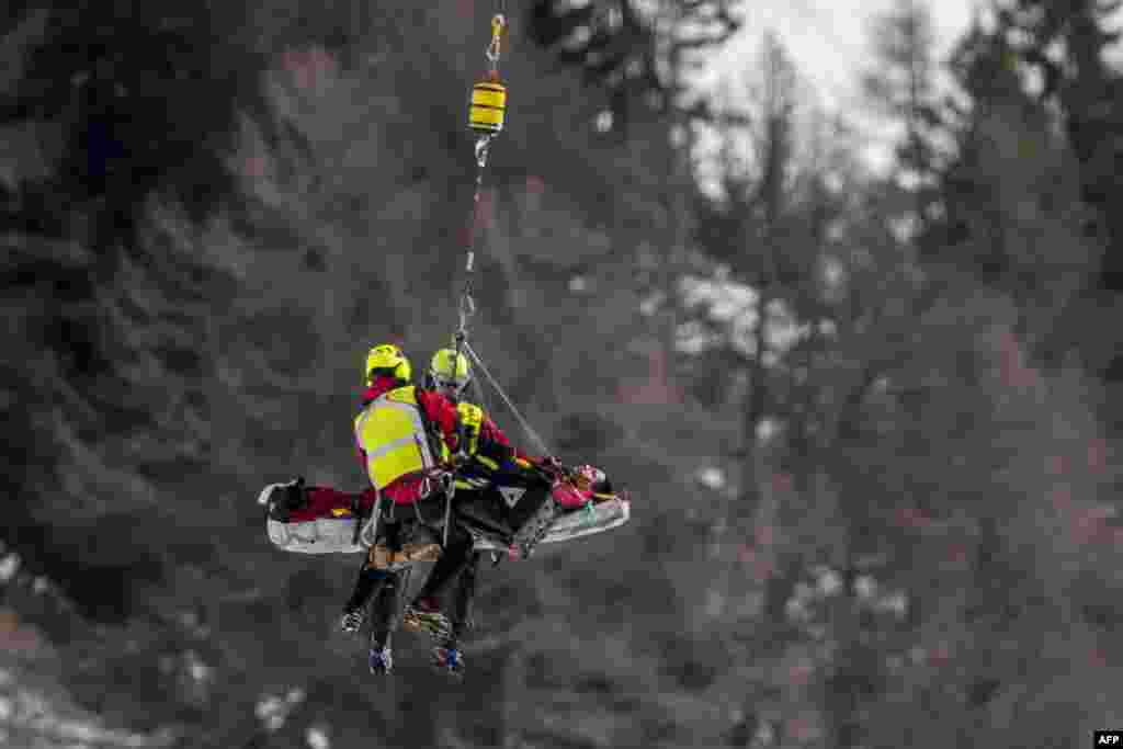 France&#39;s Nils Alphand is evacuated by helicopter after he crashed during a men&#39;s downhill training event at the FIS Alpine Skiing World Cup in Crans-Montana, Switzerland.