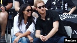 El príncipe Harry junto a su prometida, la actriz estadounidense Meghan Markle durante un evento de los Juegos Invictus enToronto, Canadá, el 25 de septiembre de 2017.