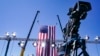 FILE - A news camera is set up at an election campaign rally in Old Forge, Pennsylvania, Aug. 20, 2020.