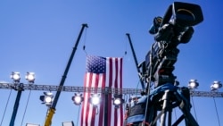 FILE - A news camera is set up at an election campaign rally in Old Forge, Pennsylvania, Aug. 20, 2020.