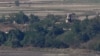 지난 20일 한국 경기도 파주의 한 전망대에서 바라본 비무장지대(DMZ) 북측의 북한군 초소와 군사 철책.