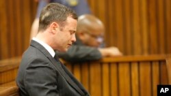 Oscar Pistorius, who was found not guilty in the shooting death of his girlfriend, Reeva Steenkamp, cries in the dock in Pretoria, South Africa, Sept. 11, 2014.