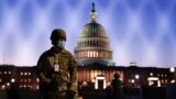 Members of the National Guard gather at the U.S. Capitol as the House of Representatives prepares to begin the voting process on a resolution demanding U.S. Vice President Pence and the cabinet remove President Trump from office, in Washington, U.S., Janu