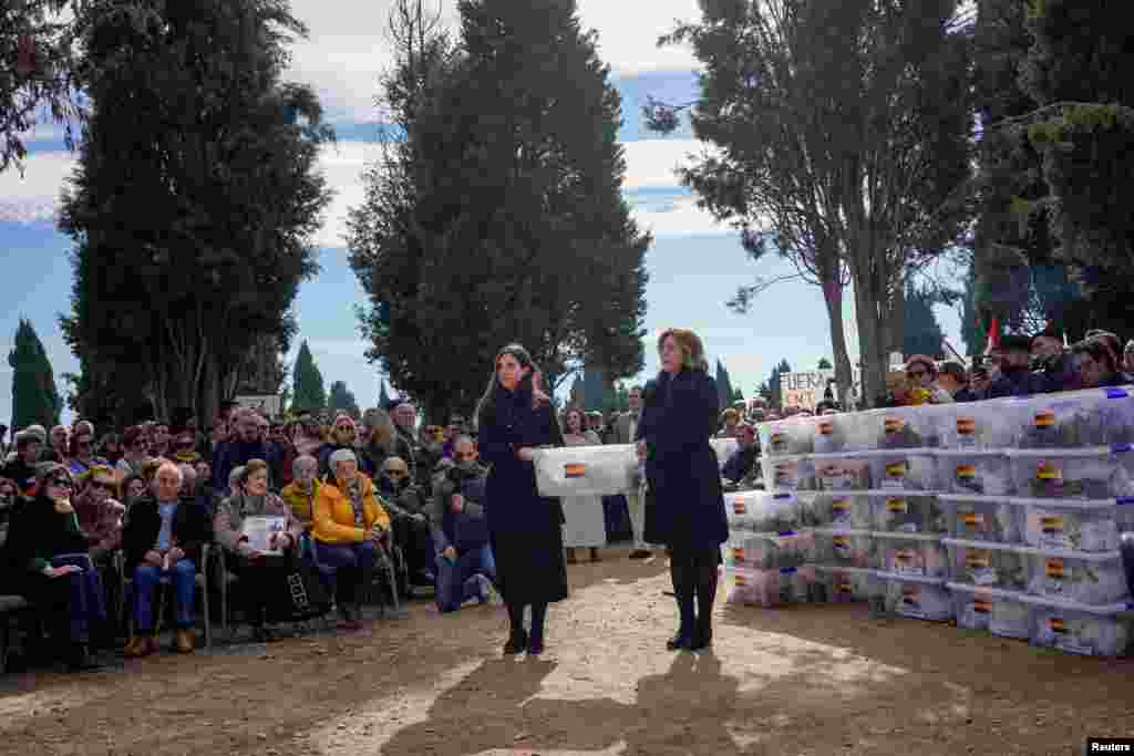 Members of the Association for the Recovery of Historical Memory of Valladolid take part in the burial of 245 people killed by the late Spanish dictator Francisco Franco&#39;s forces during the civil war, at El Carmen&#39;s cemetery in Valladolid.