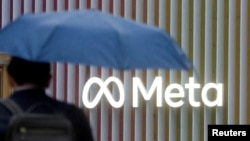 FILE - Logo of Meta Platforms is seen in Davos