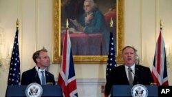 Secretary of State Mike Pompeo, right, speaks at a news conference with British Foreign Secretary Dominic Raab at the State Department in Washington, Sept. 16, 2020.