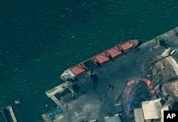 This Department of Justice image shows what it says is the North Korean cargo ship Wise Honest docked at an unknown port. The Trump administration has seized the North Korean cargo ship used to supply coal in violation of international sanctions.
