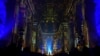 Video projections are seen at the Saint-Sulpice church in Paris, Oct. 31, 2024. (AP Photo/Marine Lesprit)