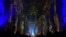 Video projections are seen at the Saint-Sulpice church in Paris, Oct. 31, 2024. (AP Photo/Marine Lesprit)