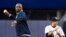 Patrick Vieira, left, head of the elite development squad at Manchester City Football Club, throws out the ceremonial first pitch near New York Yankees' Hiroki Kuroda, Yankee Stadium, New York, May 17, 2013.