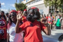A United Transformation Movement supporter wears a unique mask as a preventive measure against the spread of the COVID-19 at Mount Soche hotel in Blantyre, May 6, 2020, Malawi.