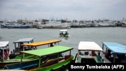 Ilustrasi - Kapal nelayan berlabuh di Pelabuhan Benoa, Denpasar, Bali, 26 Februari 2013. (AFP/Sonny Tumbelaka)