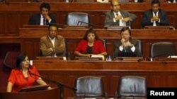 Peruvian Prime Minister Ana Jara answers questions about a spying scandal linked to Peru's National Intelligence Office at the Congress in Lima, March 19, 2015. 