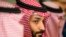 FILE - Saudi Crown Prince Mohammed bin Salman meets with U.S. Defense Secretary Jim Mattis at the Pentagon in Washington, March 22, 2018.