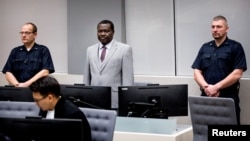 FILE - Central African Republic's soccer executive and alleged militia leader, Patrice-Edouard Ngaissona, appears before the International Criminal Court in The Hague, Netherlands, Jan. 25, 2019. 