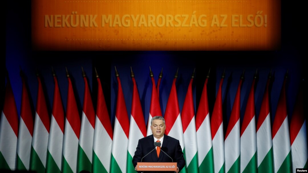Hungarian Prime Minister Viktor Orban delivers his annual state of the nation speech in Budapest, Hungary, Feb. 18, 2018. Slogan reads "For us, Hungary first!" 