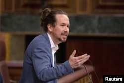 FILE - Spanish second Deputy Prime Minister Pablo Iglesias delivers his speech during a no confidence motion against the government at parliament in Madrid, Spain, Oct. 2, 2020. (Pablo Blazquez Dominguez/Pool via Reuters)