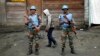 FILE - Two MONUSCO UN soldiers stand guard in Goma's port.