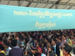 The banner calls for Cambodia to respect the Paris Peace Agreement at a ceremony to mark the 28th anniversary of the historical agreement, Phnom Penh, Cambodia, October 23, 2019. (Hul Reaksmey/VOA Khmer)