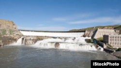 Many dams help control the flow of the Missouri River. This one is in Montana.
