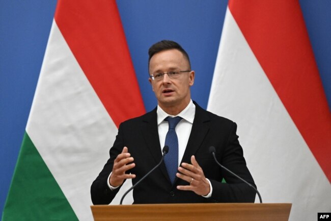 FILE - Hungary’s foreign and trade minister Peter Szijjarto addresses a press conference in Budapest on September 10, 2021,