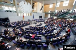 FILE - Gregor Gysi of the German left-wing Die Linke party makes a speech during a session of Germany's parliament, the Bundestag, in Berlin, Germany, July 17, 2015.